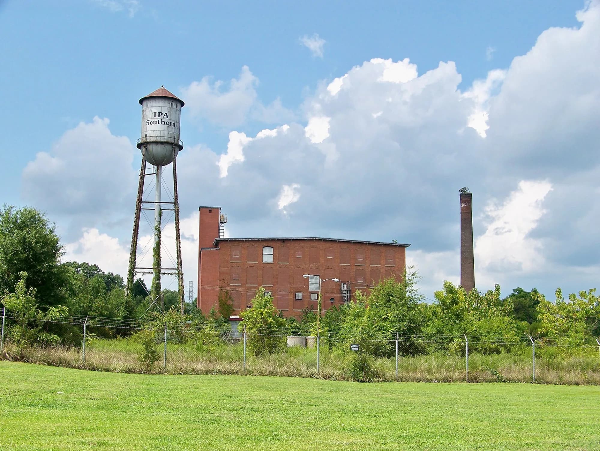 The old Easley textile mill, its brick smokestack and water tower